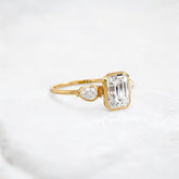 royal-whisper-emerald-bezel-hidden-moissanite-engagement-ring-1-5-ct-yellow-gold-gemfora-2